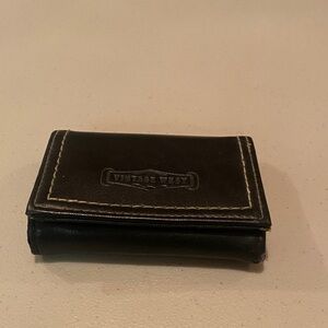 Vintage West Leather tri-fold wallet. Color: Black. Money slot. Change pocket.